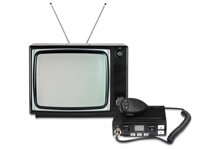 Old retro black and white tv set and old radio transmitter
