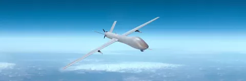 Unmanned military drone on patrol air territory at high altitude