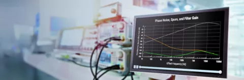 Computer monitor in front of oscilloscope, radio measuring equipment