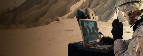 Manpack military radio in desert