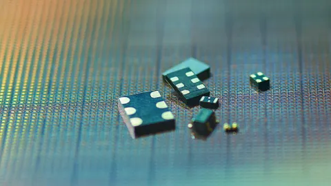 MEMS timing devices on a silicon wafer