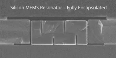 silicon MEMS resonator cross section image, fully encapsulated
